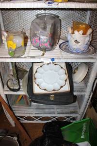 lot 94 image: Bottom two shelves contents and wicker shelves