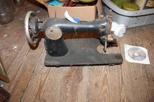 lot 116 image: antique sewing machine
