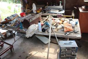 lot 150 image: Vintage wood Door Table only additional table leg hardware available. (Contents NOT included)