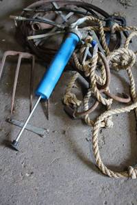 lot 162 image: Grappling hook, grease guns and wire snakes