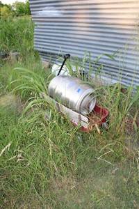 lot 291 image: Radio flyer wagon and empty keg