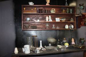 lot 234 image: Vases, Glass Compote, Lidded Candy Dish, Metal Boat Wall Art, Vintage Food Grinder and More