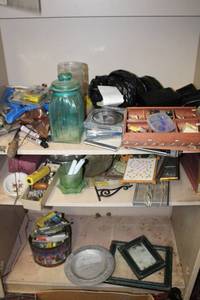 lot 244 image: Misc. Lot Green Glass Cannister, CDs, Trinkets