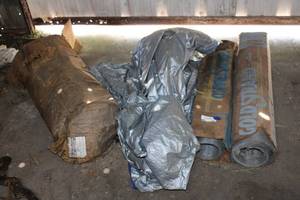 lot 156 image: Rolls of screen large tarp and Plastic sheeting roll