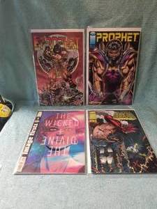 lot 38 image: Selection of 4 comic books - Prophet(2), The Wicked  The Divine #1, and The Savage Dragon - image comics
