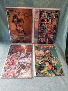 lot 41 image: Selection of 4 comic books - Darkness, DeathMate, ShadowHawk, and Pitt