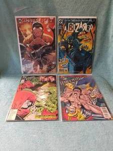 lot 86 image: Selection of 4 comic books - Injustice 2, Bizarro #1, Hawkman, and The Weird - DC comics