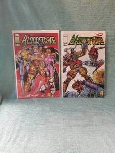 lot 128 image: BloodStrike Image com books #2, and 4