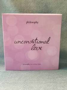 lot 99 image: Unconditional Love perfume and lotion set