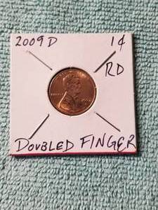 lot 16 image: 2009-D - Double finger penny