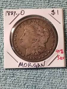 lot 276 image: 1887-O Morgan silver dollar - carded