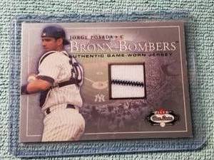 lot 24 image: 2003 Fleer - Jorge Posada game worn jersey card