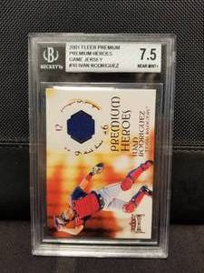 lot 147 image: 2001 Fleer Ivan Rodriguez - game worn jersey baseball card - graded 7.5