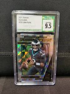 lot 252 image: 2021 Donruss Dominators - Jalen Hurts football card - graded 9.5