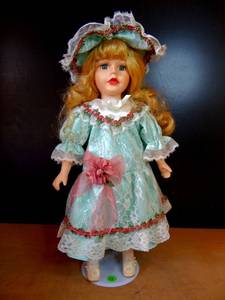 lot 52 image: BEAUTIFUL THE COLLECTORS CHOICE BLONDE HAIRED PORCELAIN DOLL WITH STAND $$
