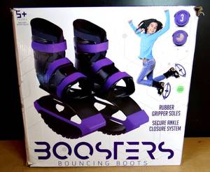 lot 100 image: Madd Gear Boosters Bouncing Boots, Purple & Black, Rubber Soles, Youth Size 3-6 (USEDSEALED BOX)