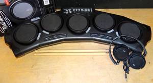 lot 101 image: FIRST ACT DIGITAL DRUMS - LIKE NEWOPEN BOX W STICKS AND HEAD PHONES $$$