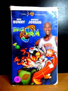 lot 124 image: Space Jam VHS Tape Movie With Coin Bugs Bunny Michael Jordan 1996 Warner Bros