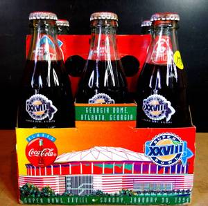 lot 173 image: RARE COCA-COLA SUPERBOWL 28 (XXVIII) COLLECTORS BOTTLES IN 6 PACK COLORFUL HOLDER