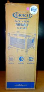 lot 210 image: Graco Graco Pack n Play Portable Playard, Carnival - NEWSEALED BOX