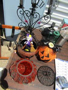 lot 32 image: two Halloween candle stands , bronze pumpkin and other pumpkin decor