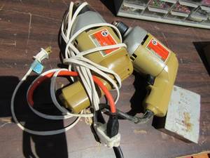 lot 33 image: 2 B&D drills (38 and 1.25) and 1 box of Chicago drill bits