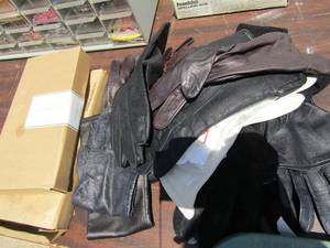 lot 34 image: Lot of Womens black and white gloves plus 2 boxes of Meherna makeup brushes