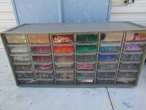 lot 50 image: Jewlery storage- 36 slots full of all shapes and colors of beads