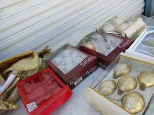 lot 58 image: 5 boxes of 5 assorted glass ornaments , gold tree skirt and more