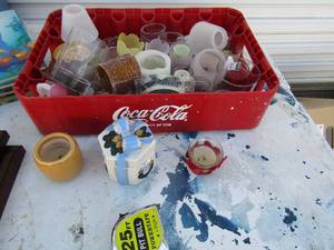 lot 65 image: Coke tray full of assorted candles