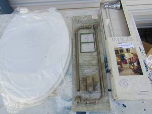 lot 76 image: Images by Baldwin 18 towel bar NEW, NEW toilet seat, NEW swing arm adjustable  curtain rod