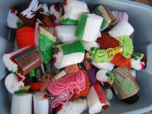 lot 80 image: Tote full of red heart yarn bundles