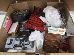 lot 97 image: Small box of new and used doll house accessories