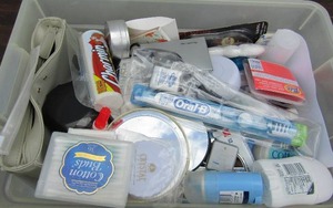 lot 113 image: Tub of previously opened items- lotions and such