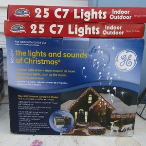 lot 142 image: 2 NEW packs of string lights , New musical light show lights and sounds plays 20 christmas carols in 3 modes