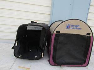 lot 156 image: Black Eddie Bauer Pet carrier and purple carrier too