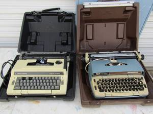lot 157 image: 2 Smith Corona typewriters in hard cases