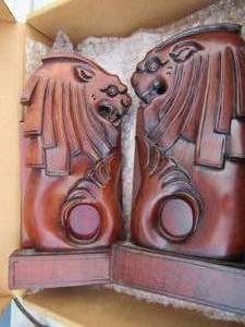 lot 164 image: New  cherry wood lion bookends 9 X 5