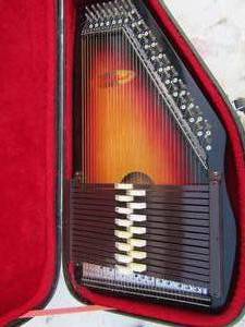 lot 171 image: ChromaHarp, Sunburst -- 36 String, 15 Chord in carrying case mint condition