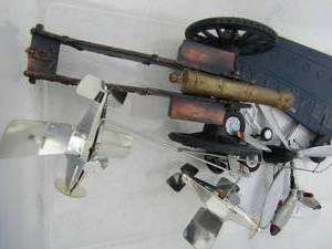 lot 204 image: Metal CANNON, On wheels  various air plane pieces - wheel  wings   blades