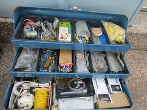 lot 13 image: blue tool box full of wire connectors and wire devices