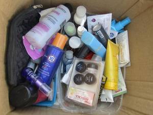 lot 215 image: Box of preopened hair care and manicure products