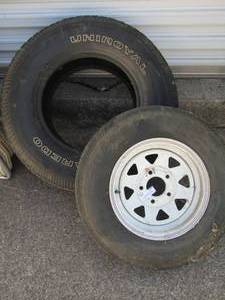 lot 250 image: SPORT TRAX TRAILER TIRE B78-13ST ON RIM  &  UNIROYAL TIRE P24575R16