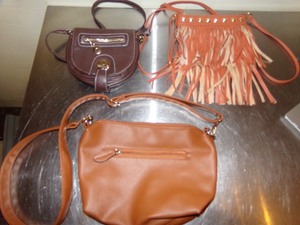 lot 84 image: Three Brown Leather Purses