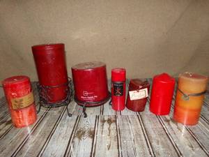 lot 134 image: Red Pillar Candles With Metal Holders