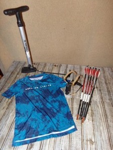 lot 249 image: Arrows, Bike Pump, Sling Shot, & Kids Sports Shirt