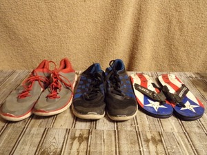 lot 274 image: Two Under Armour 10 12 Running Shoes & Size 11 Flipflops