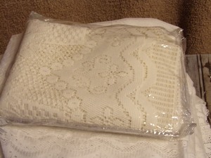 lot 282 image: 8 piece laced curtain set 88in X 58in