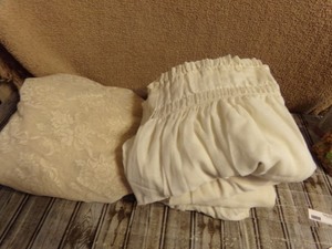 lot 284 image: beige lace curtain (115in w X 80in L) ,and 5 sheer ruffle top curtains (26in X 99in)