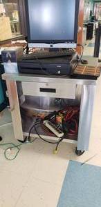 lot 12 image: Delfield Rolling Stainless Steel Cashiers Counter, Model SCS-30, Contents Not Included